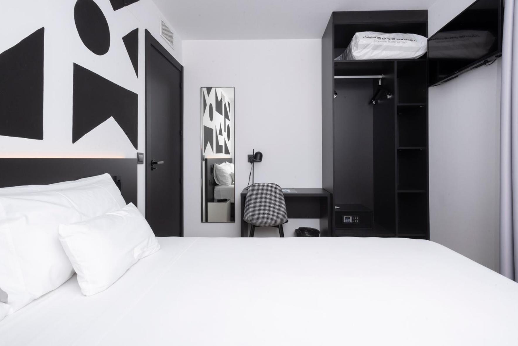 Sercotel Plana Suites Vall de Uxó Rum bild