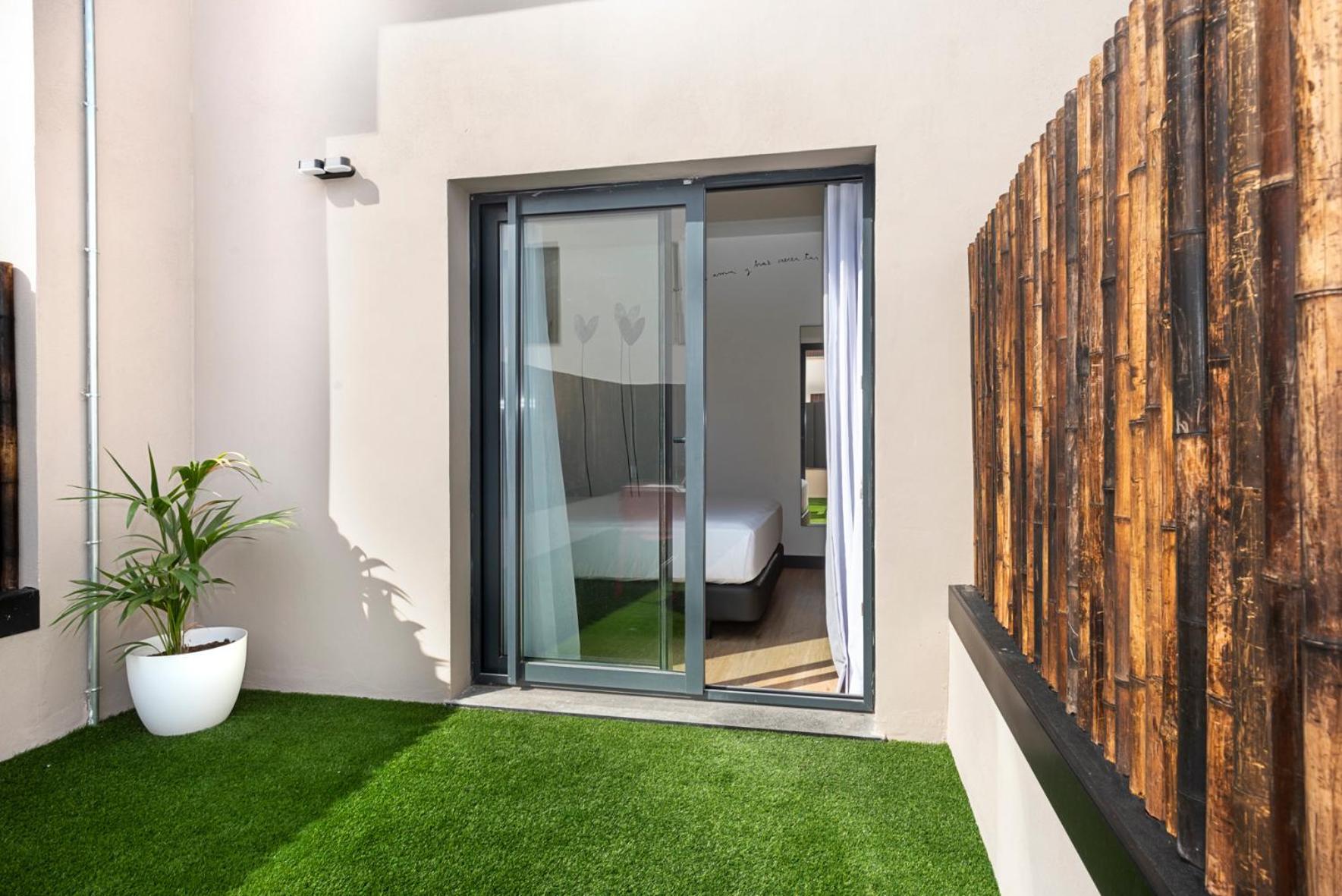 Sercotel Plana Suites Vall de Uxó Rum bild